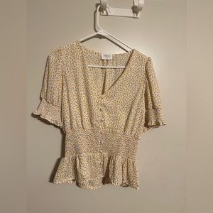 Sienna Sky short sleeved blouse.